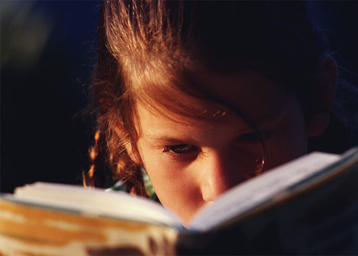 School child reading